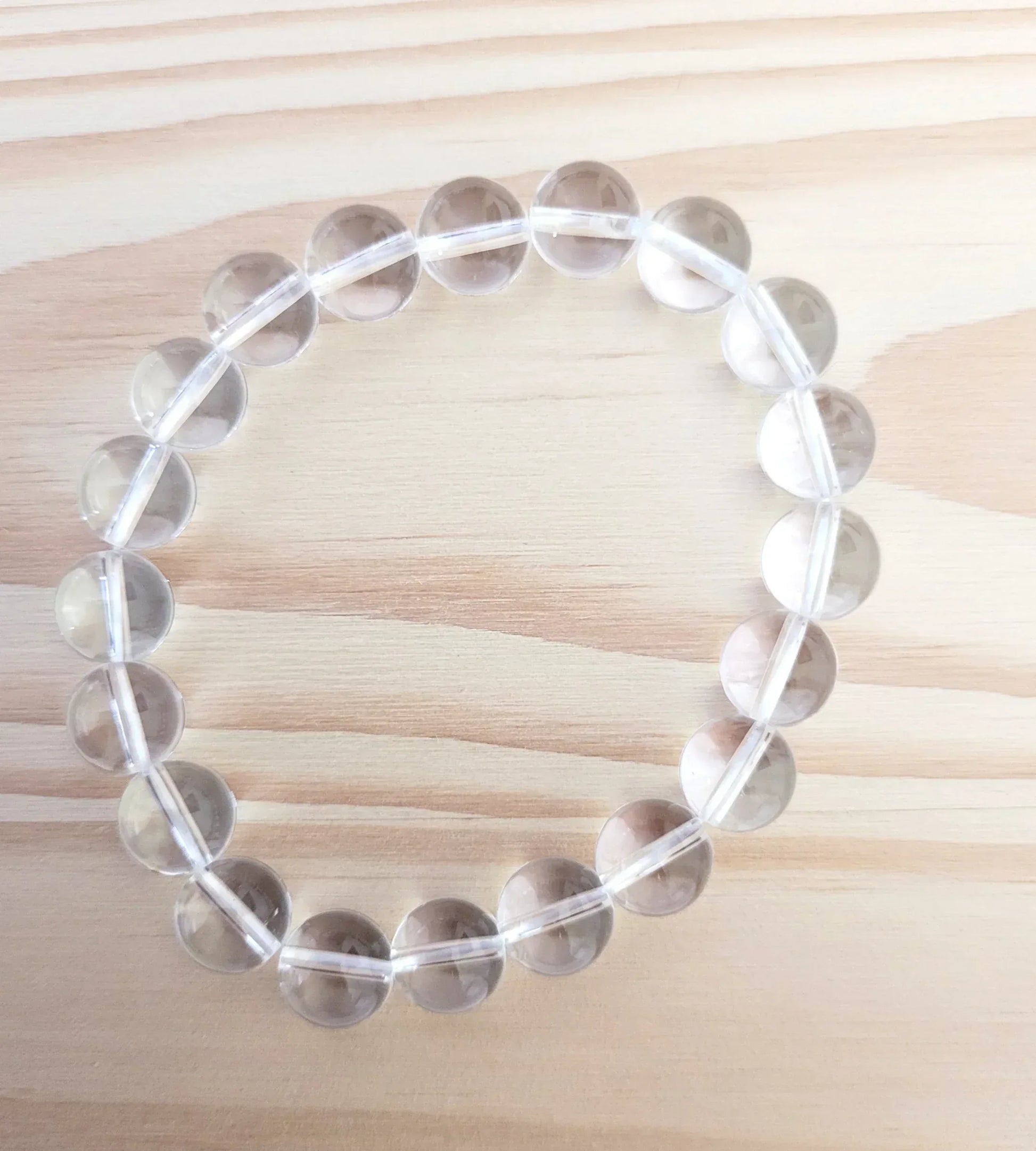Bracelet en Cristal de roche 10mm - Pierres de Terre Happy