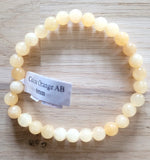 Bracelet en Calcite Orange 6mm - Pierres de Terre Happy