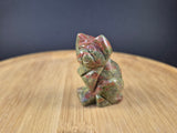 Chat en Unakite